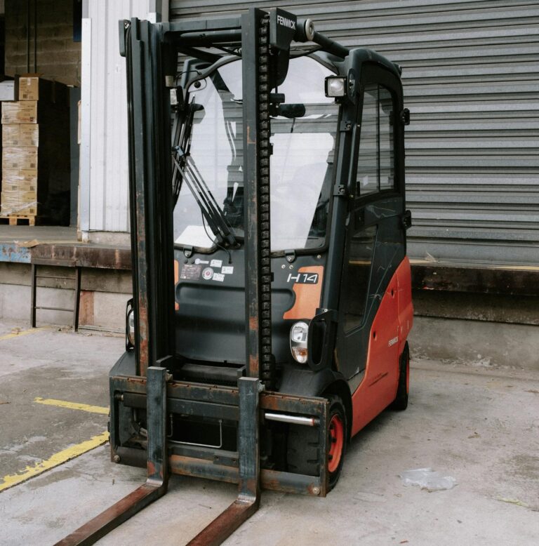 A Red and Black Fork Lift